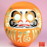 縁起物の置物：福だるま・オレンジ色