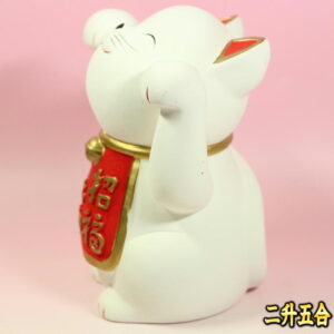 開運の縁起物の置物：左側面画像