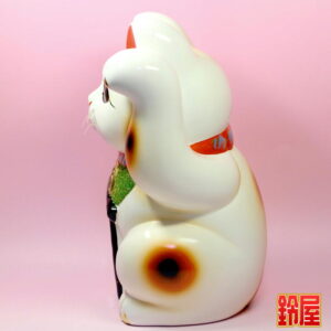 縁起物の千客万来の置物：左側面画像