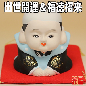 出世祈願の縁起物である福助人形の置物を販売