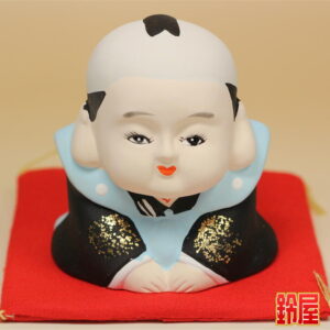 出世祈願の縁起物である福助人形の置物1